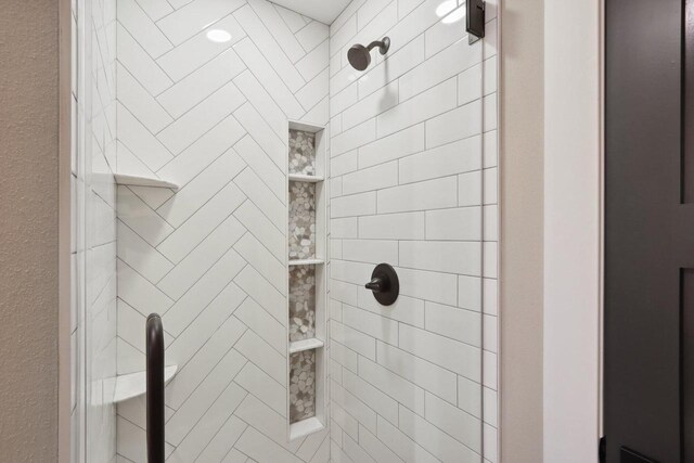 bathroom featuring a stall shower