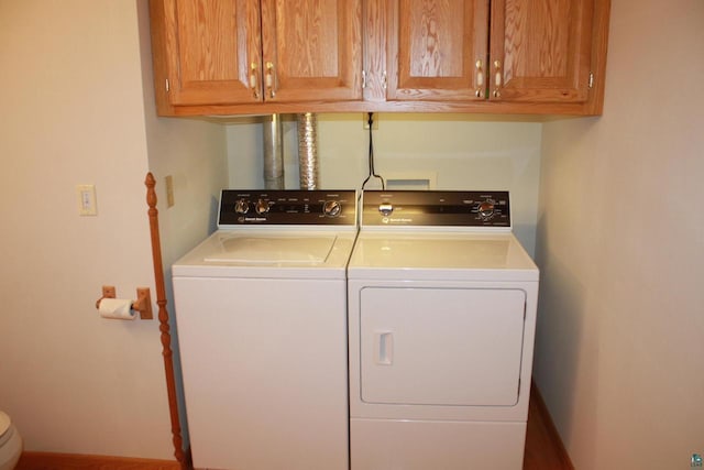 laundry area with washing machine and dryer and laundry area