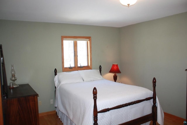 bedroom featuring light wood finished floors