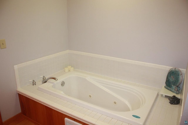 bathroom with a jetted tub