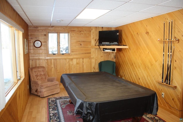 playroom featuring billiards, wood finished floors, wood walls, and a paneled ceiling