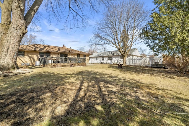 view of yard featuring a wooden deck