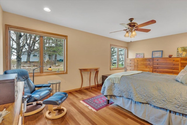 bedroom with recessed lighting, a ceiling fan, baseboards, and wood finished floors