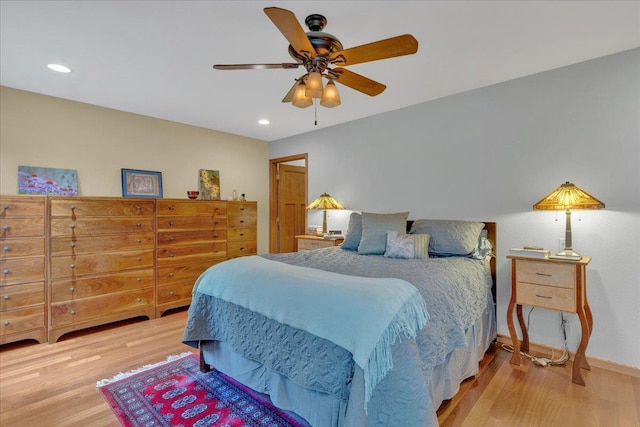 bedroom with recessed lighting, baseboards, ceiling fan, and wood finished floors