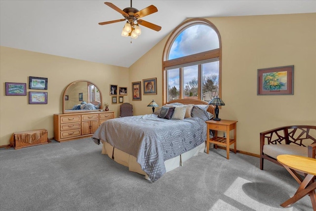 bedroom featuring ceiling fan, baseboards, carpet floors, and high vaulted ceiling