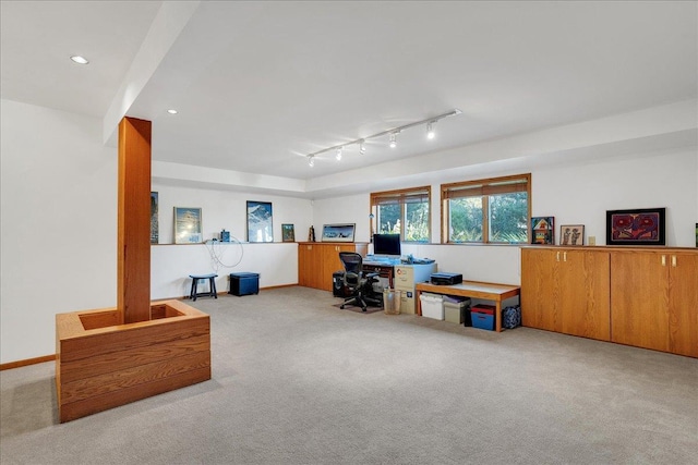 office space featuring track lighting, recessed lighting, carpet, and baseboards