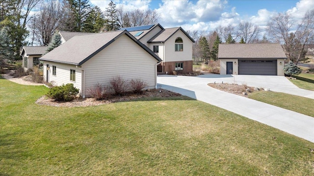 view of home's exterior featuring an outbuilding, a lawn, and a garage