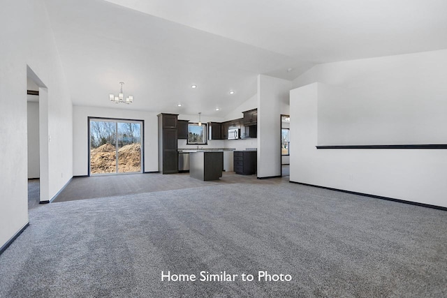 unfurnished living room featuring baseboards, light carpet, a notable chandelier, and vaulted ceiling