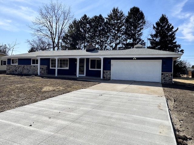 ranch-style home featuring stone siding, driveway, covered porch, and an attached garage