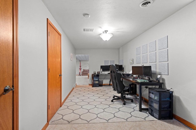 office with visible vents and baseboards