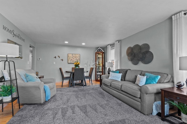 living room featuring recessed lighting and wood finished floors