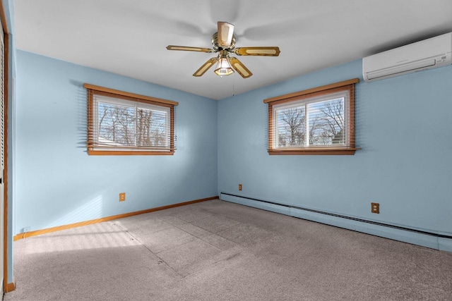 carpeted spare room with baseboard heating, a healthy amount of sunlight, a wall mounted air conditioner, and ceiling fan