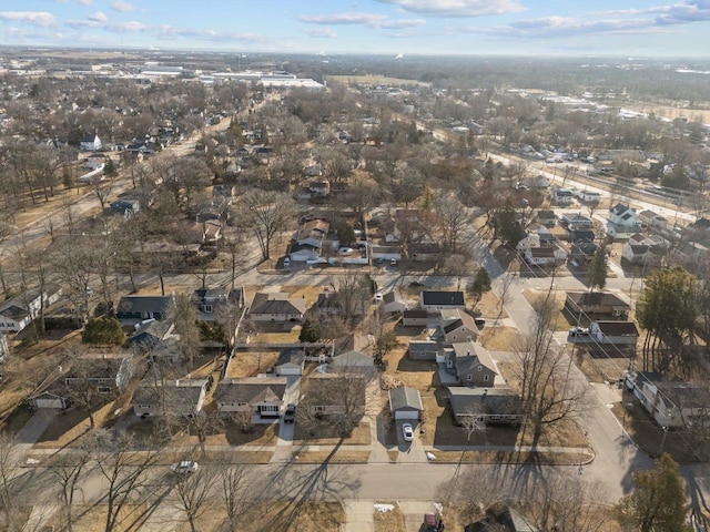 birds eye view of property with a residential view