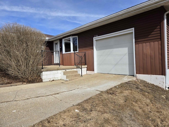 exterior space featuring concrete driveway