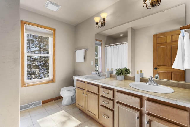 full bath with tile patterned floors, visible vents, and a sink