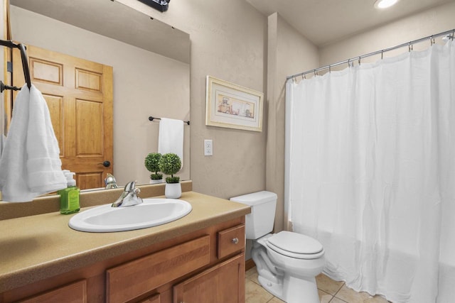 full bath featuring tile patterned flooring, toilet, and vanity