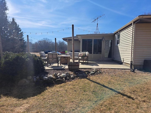 view of yard with a patio, outdoor lounge area, and a sunroom