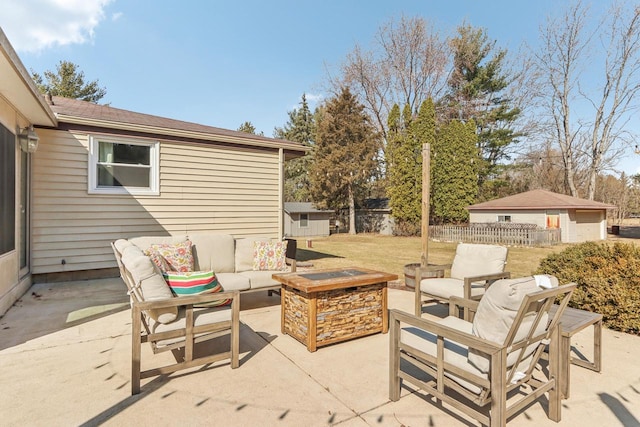 view of patio / terrace featuring an outdoor hangout area and fence