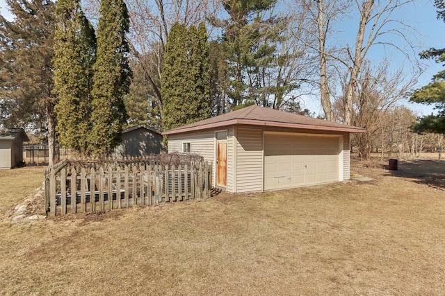 detached garage with fence