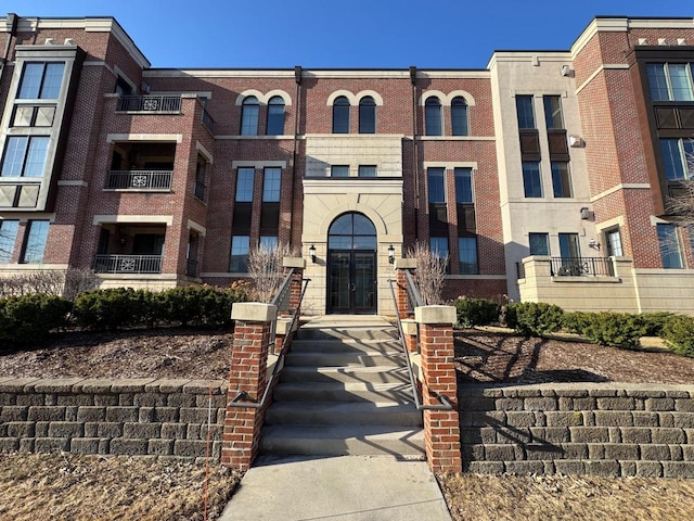 view of front of home with brick siding