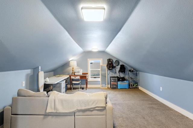 carpeted living room featuring a textured ceiling, baseboards, and vaulted ceiling