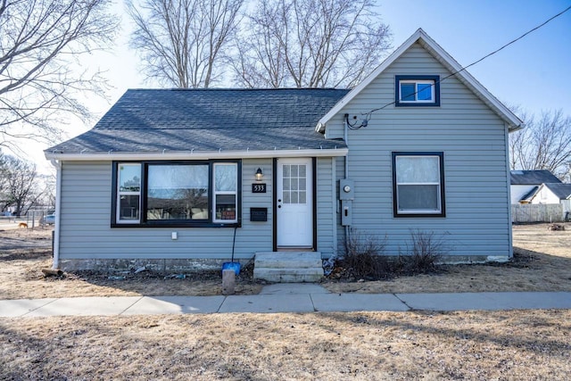 view of front of house featuring a shingled roof