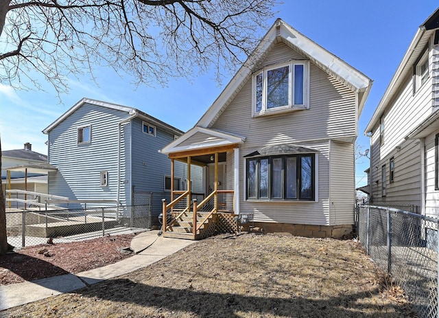 view of front of home with a fenced backyard