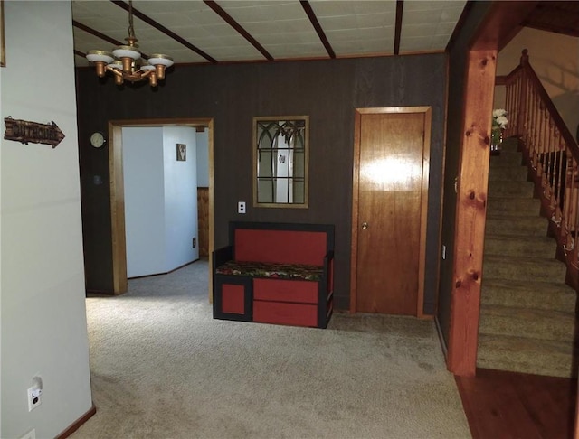 interior space with stairs and a chandelier