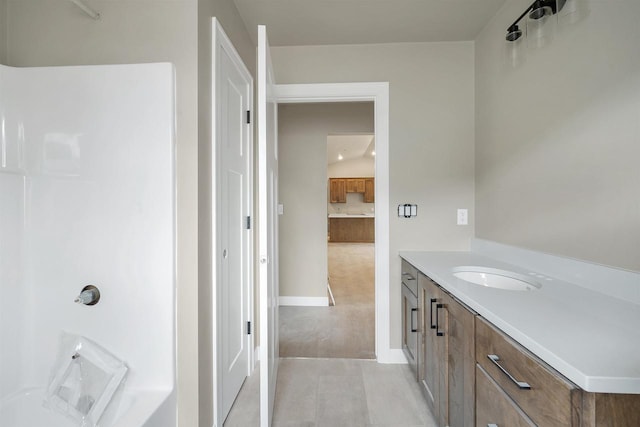 2570 Meyer Way, De Pere, WI 54115 - bathroom featuring vanity, tile patterned flooring, and baseboards