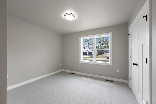 2570 Meyer Way, De Pere, WI 54115 - unfurnished bedroom with light carpet and baseboards