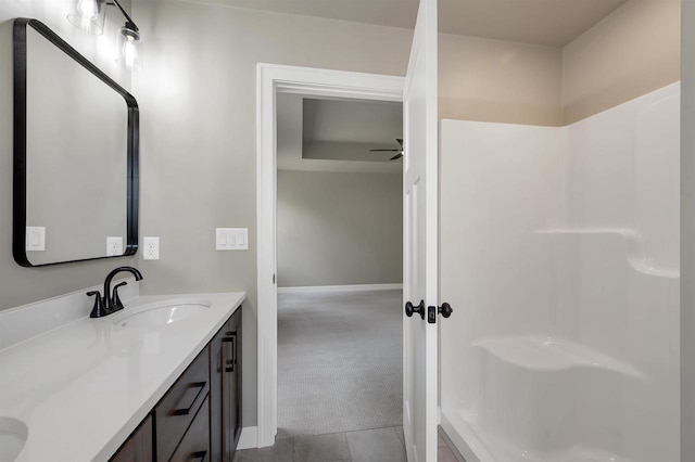 2570 Meyer Way, De Pere, WI 54115 - full bathroom featuring double vanity, baseboards, tile patterned flooring, and a ceiling fan