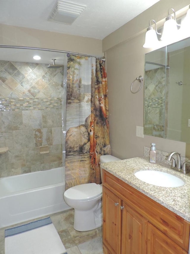 full bathroom with vanity, toilet, visible vents, and shower / tub combo with curtain