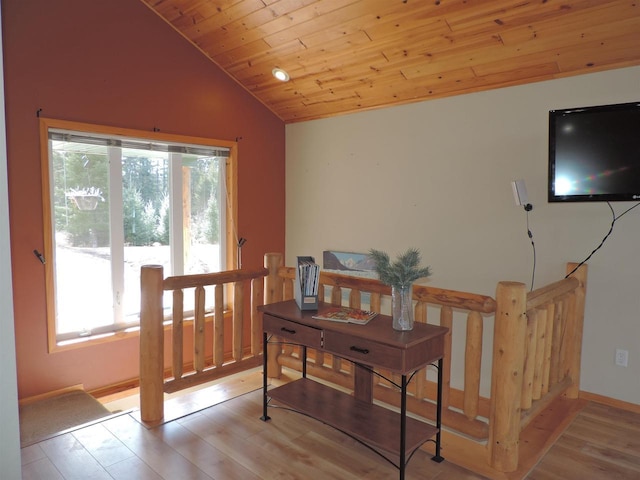 interior space with lofted ceiling, light wood-style floors, and wooden ceiling