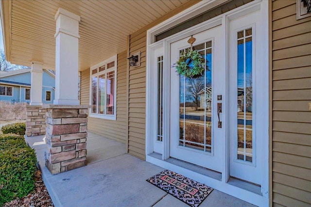 property entrance featuring covered porch