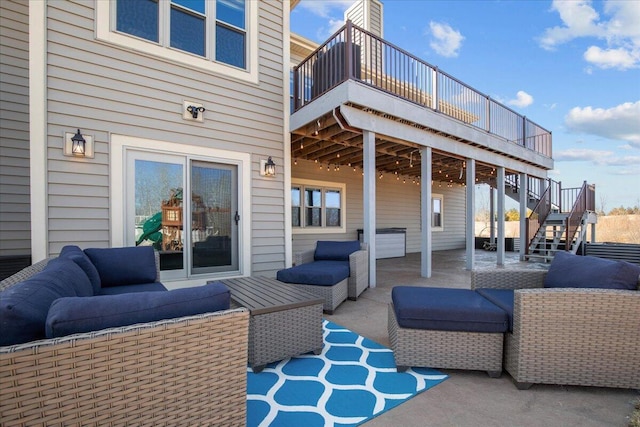 view of patio / terrace featuring outdoor lounge area, a deck, and stairs