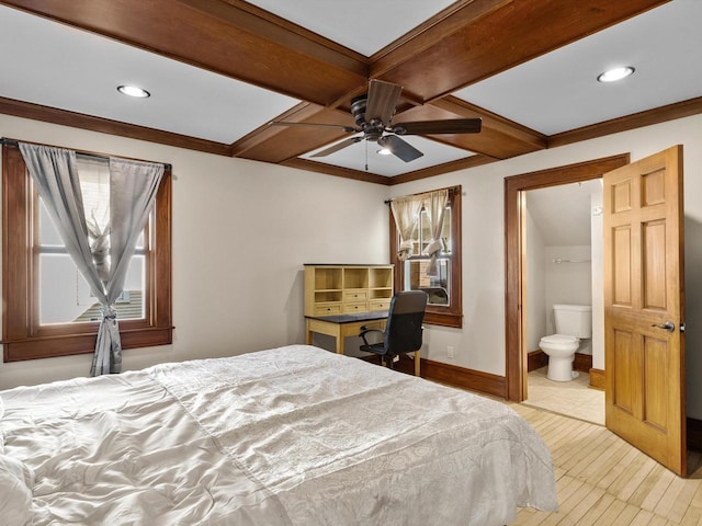 bedroom with crown molding, baseboards, beam ceiling, coffered ceiling, and ensuite bath