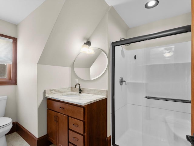 full bath featuring baseboards, toilet, a stall shower, tile patterned floors, and vanity