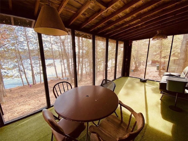 sunroom / solarium featuring wooden ceiling