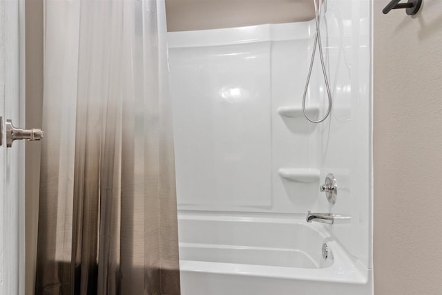 full bath with shower / bath combination with curtain