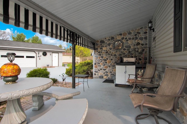 view of patio / terrace with an outdoor structure