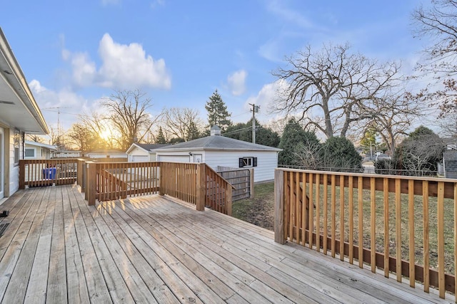 wooden deck featuring a yard