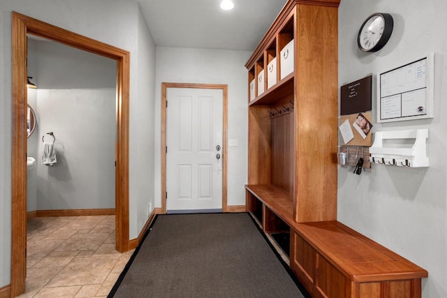 mudroom featuring baseboards