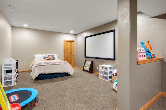 carpeted bedroom with recessed lighting and baseboards