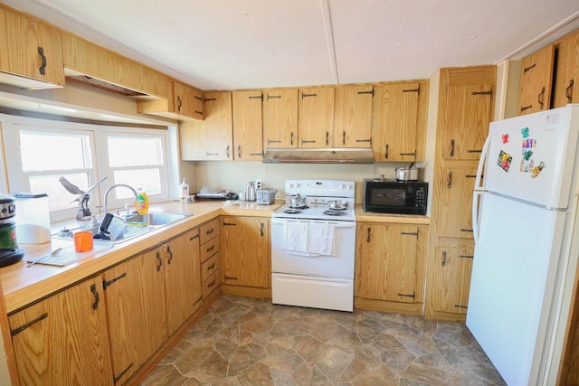 kitchen featuring under cabinet range hood, white appliances, light countertops, and a sink