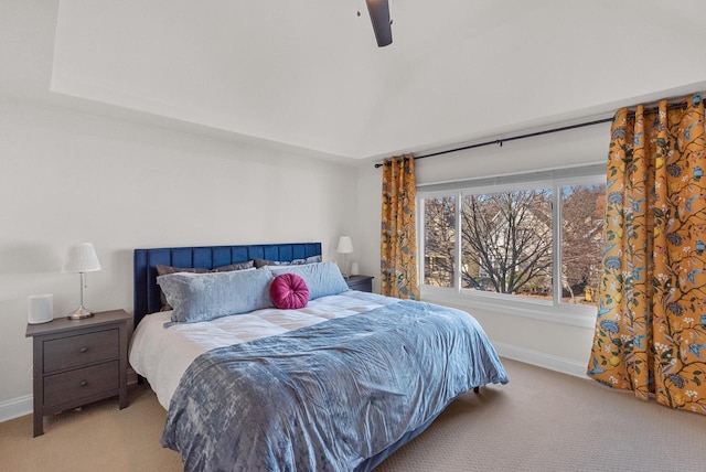 bedroom with ceiling fan, baseboards, carpet, and vaulted ceiling