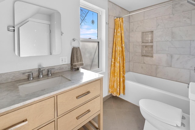 bathroom featuring tile patterned floors, toilet, vanity, and shower / bath combination with curtain