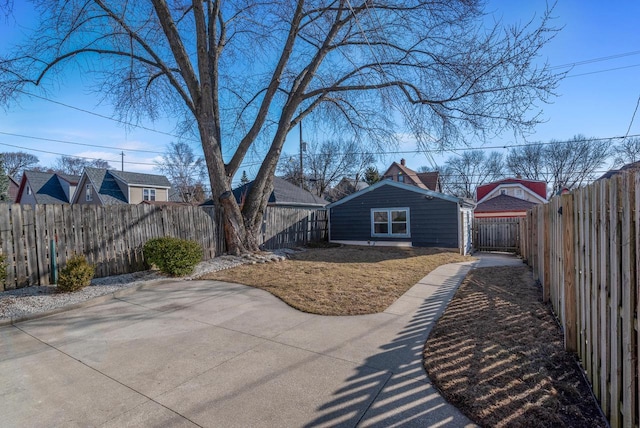 view of yard with a patio and a fenced backyard