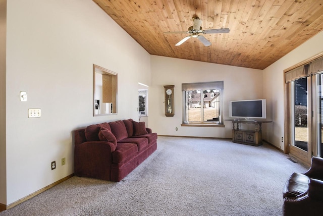 carpeted living room featuring baseboards, lofted ceiling, wood ceiling, and ceiling fan