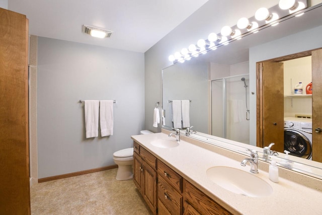 full bathroom with a sink, visible vents, washer / dryer, and a shower stall