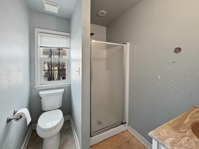 full bathroom featuring visible vents, a shower stall, baseboards, toilet, and tile patterned floors